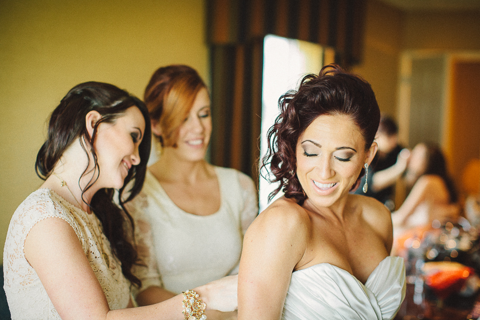 16 happy bride getting dressed - Wedding Photographer in Chicago // Jessica + Aaron