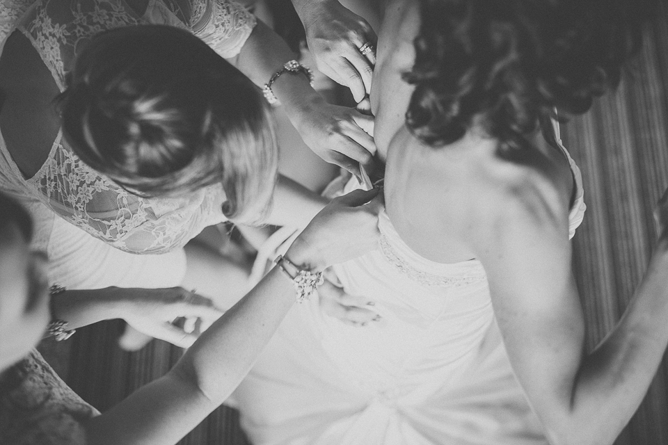 17 black and white of bride getting dressed chicago wedding - Wedding Photographer in Chicago // Jessica + Aaron