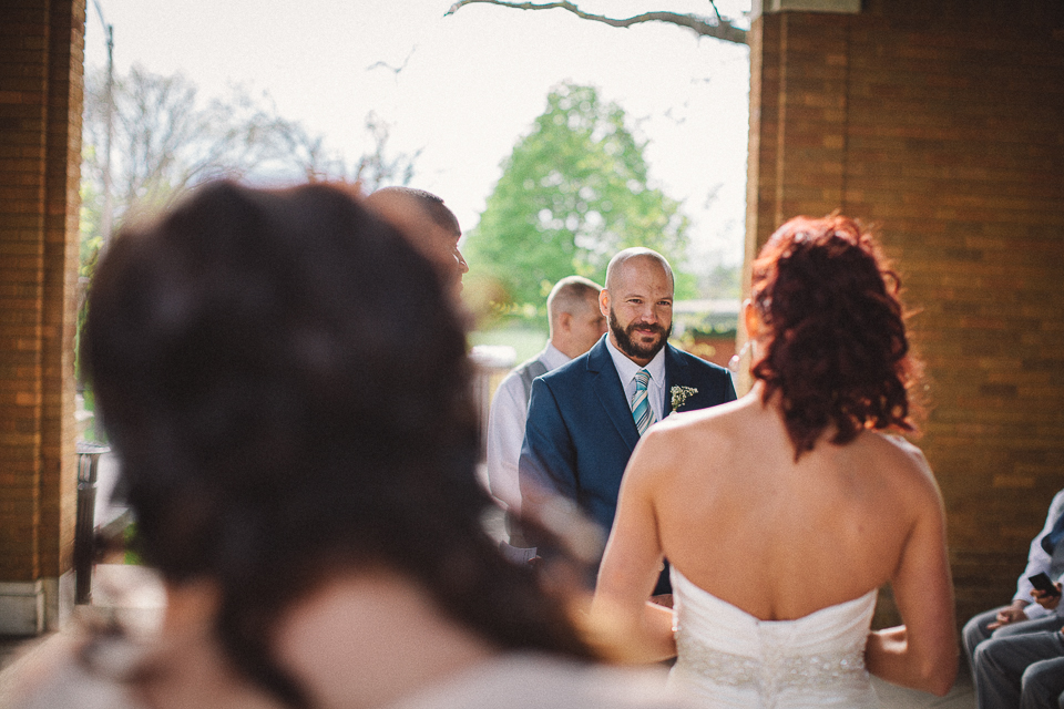 35 bride and groom exchanging vows - Wedding Photographer in Chicago // Jessica + Aaron