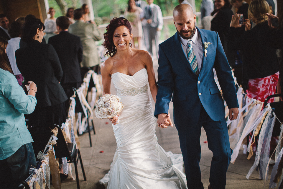 41 bride and groom walking back at their chicago wedding - Wedding Photographer in Chicago // Jessica + Aaron