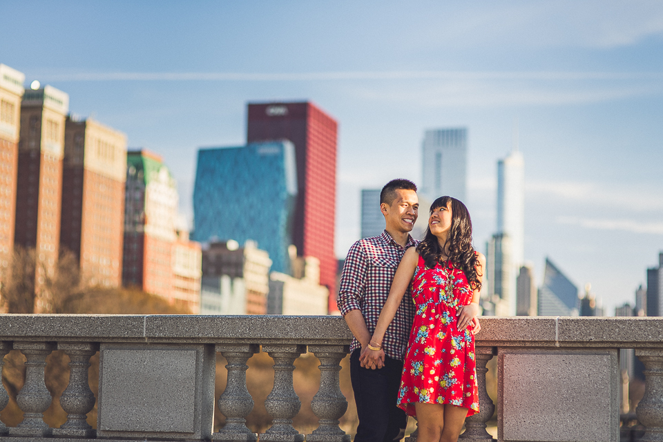 09 chicago bridge with skyling cute couple - Chicago IL Engagement Photos // Anne + Dennis