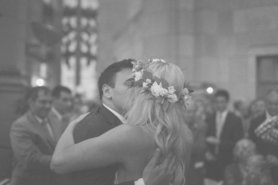 43 first kiss in black and white - Documentary Wedding Photographer in Chicago // Lynsey + Eric