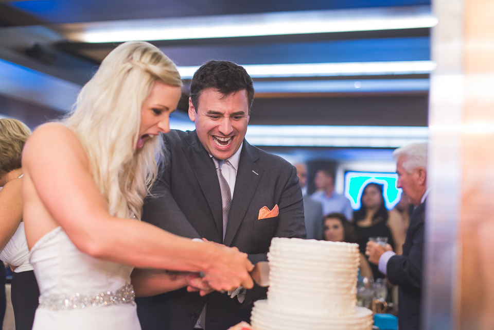 46 bride and groom cut cake - Documentary Wedding Photographer in Chicago // Lynsey + Eric