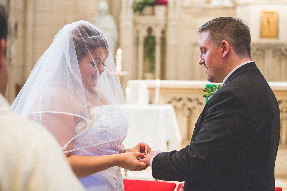 18 exchanging rings - AnaLorena + Bill // Wedding Photographer in Chicago