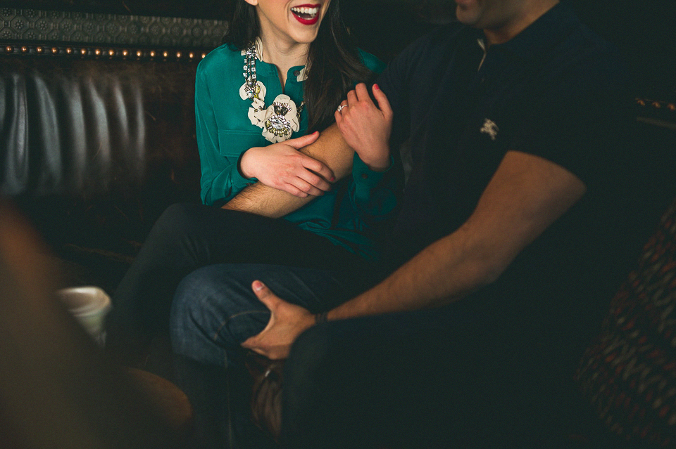 09 relaxing on leather couches - Chicago Lincoln Park Engagement Photos // Riz + Nadia