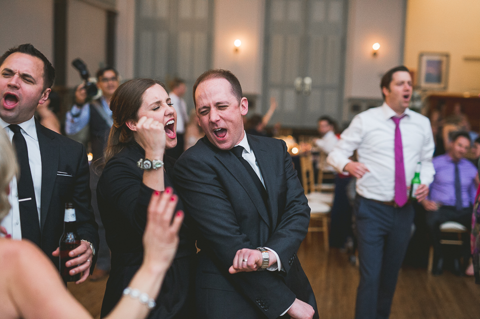 76 groom singing and dancing - Chicago Wedding Photographers // Jessica + Glenn