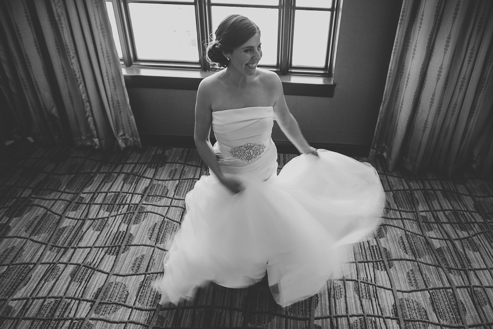22 bride swishing her dress - Mandy + Brian // Chicago Wedding Photographer