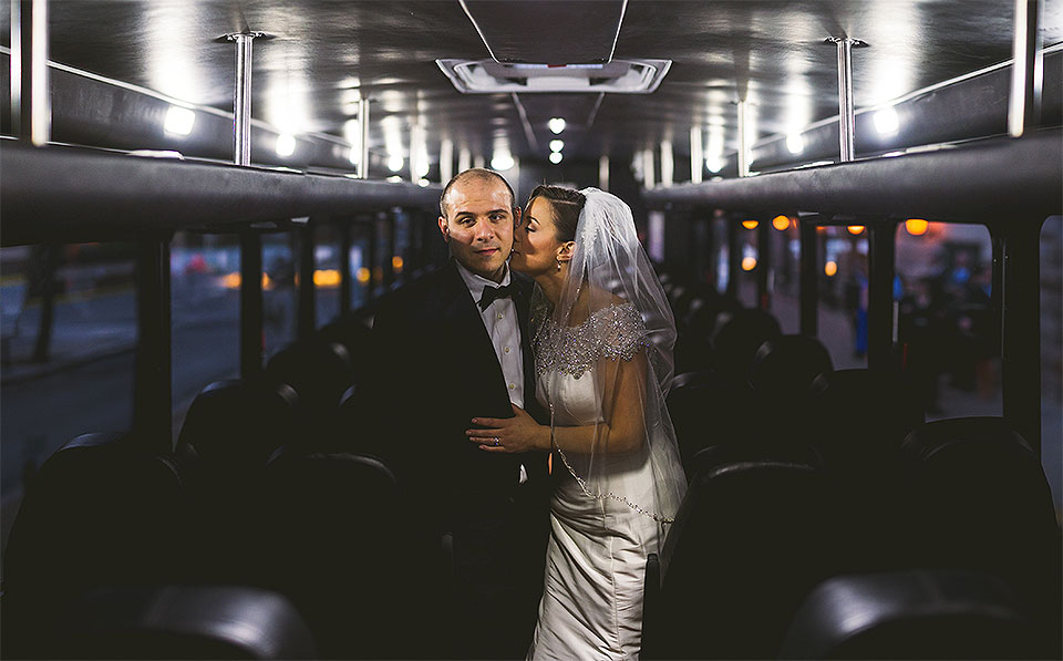 29 2 chicago panorama of bride and groom on bus - Pam + Vinny // Chicago Wedding Photographer