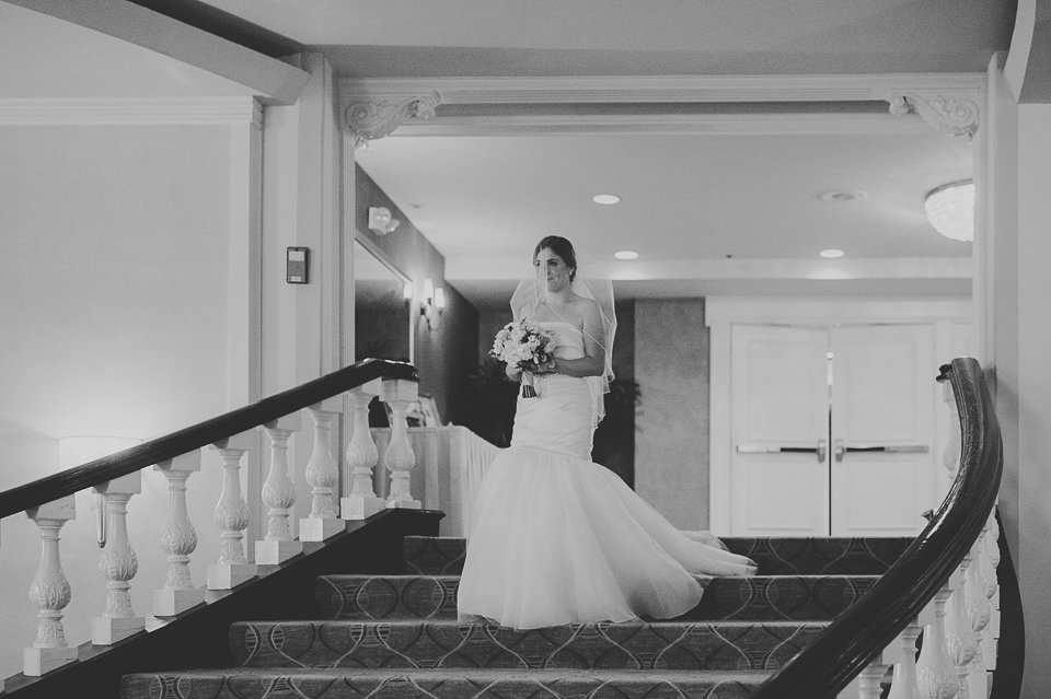 42 bride coming down the stairs - Mandy + Brian // Chicago Wedding Photographer