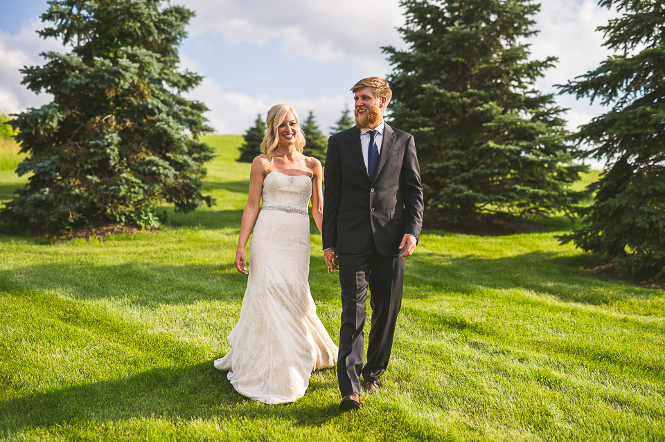 20 bride and groom walking down hilll at sunset - Centennial Park Gardens Wedding // Courtney + Greg