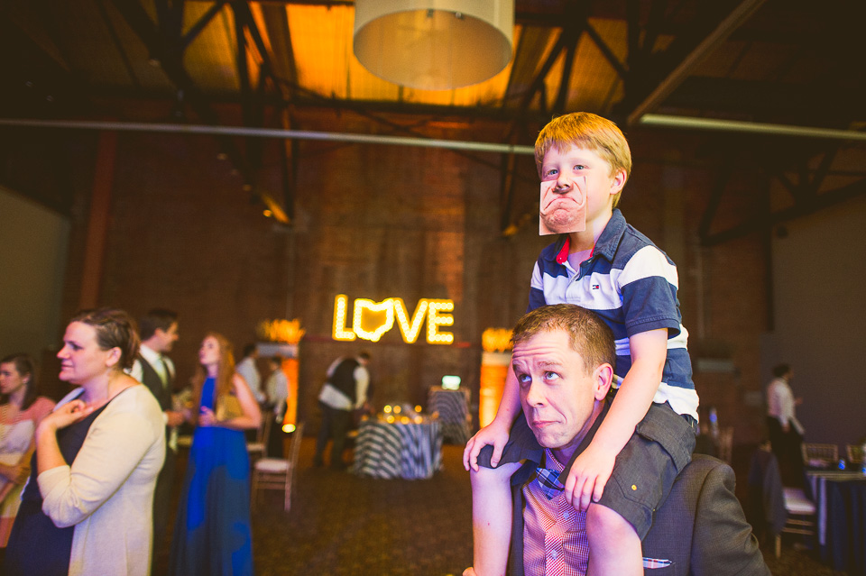 81 kid riding his dads shoulders - Wedding at Windows on the River in Cleveland // Kelly + Mike