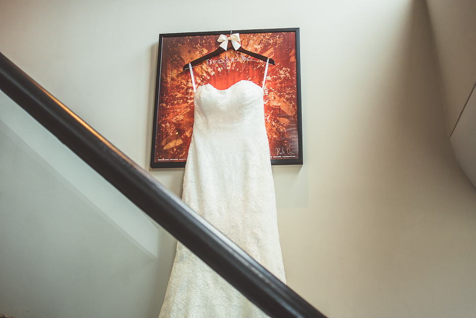 03 hanging wedding dress - Jay + Callie // Downtown Chicago Wedding Photographer