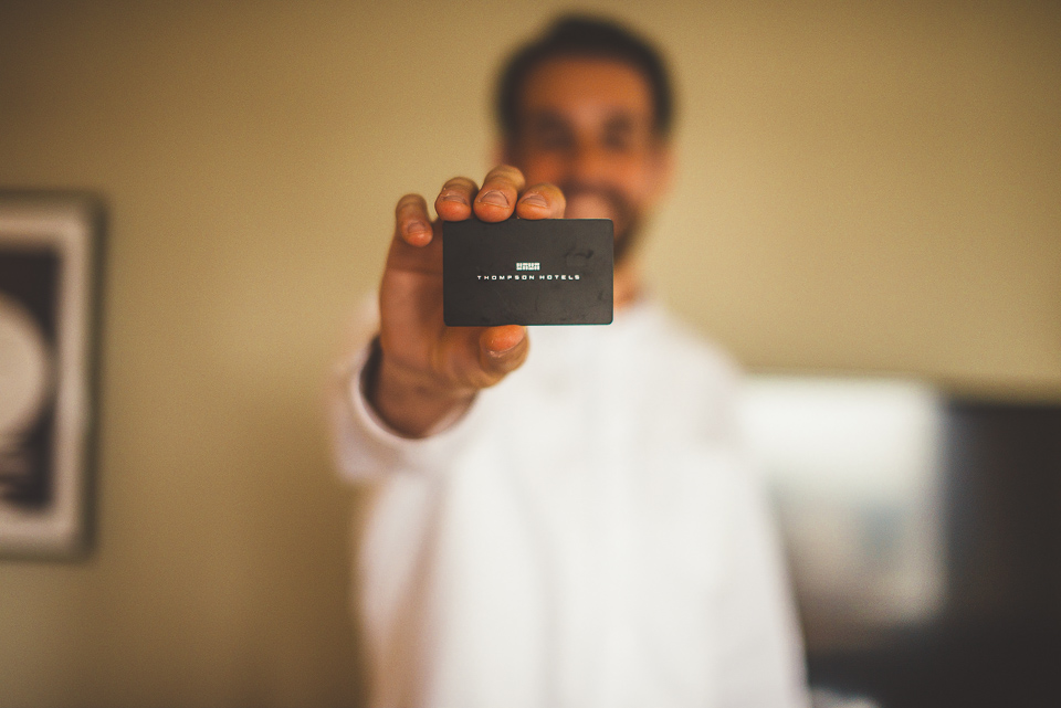 06 groom with business card - Jay + Callie // Downtown Chicago Wedding Photographer