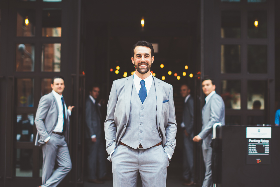 15 groom outside of hotel - Jay + Callie // Downtown Chicago Wedding Photographer