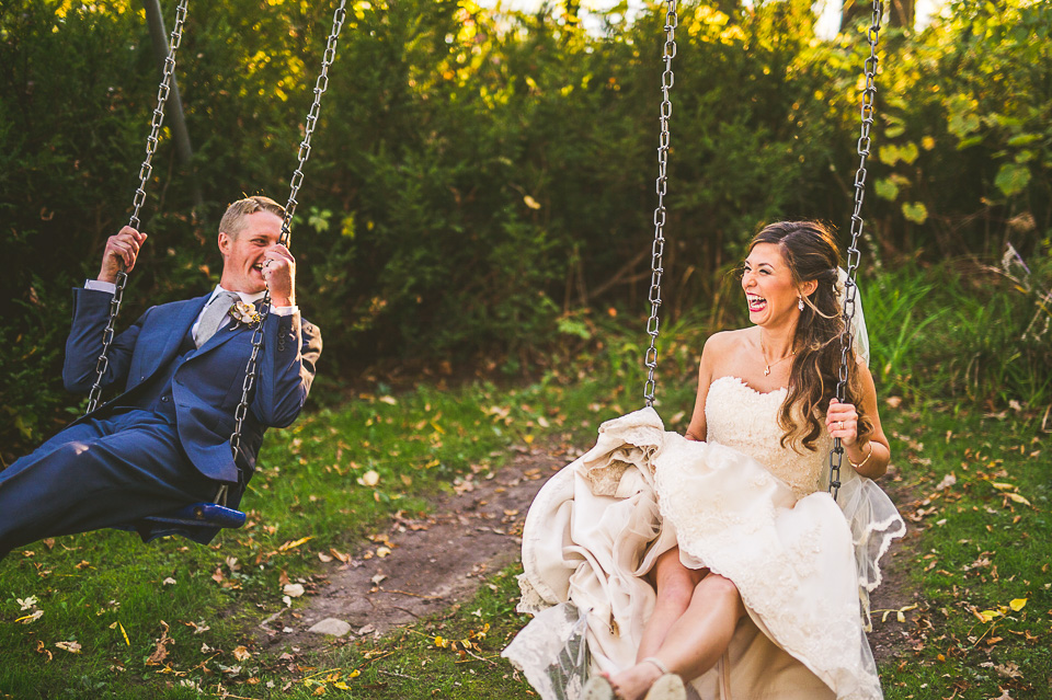 76 bride and groom swinging - Mandy + Mike // Stouts Island Lodge Wedding Photographers
