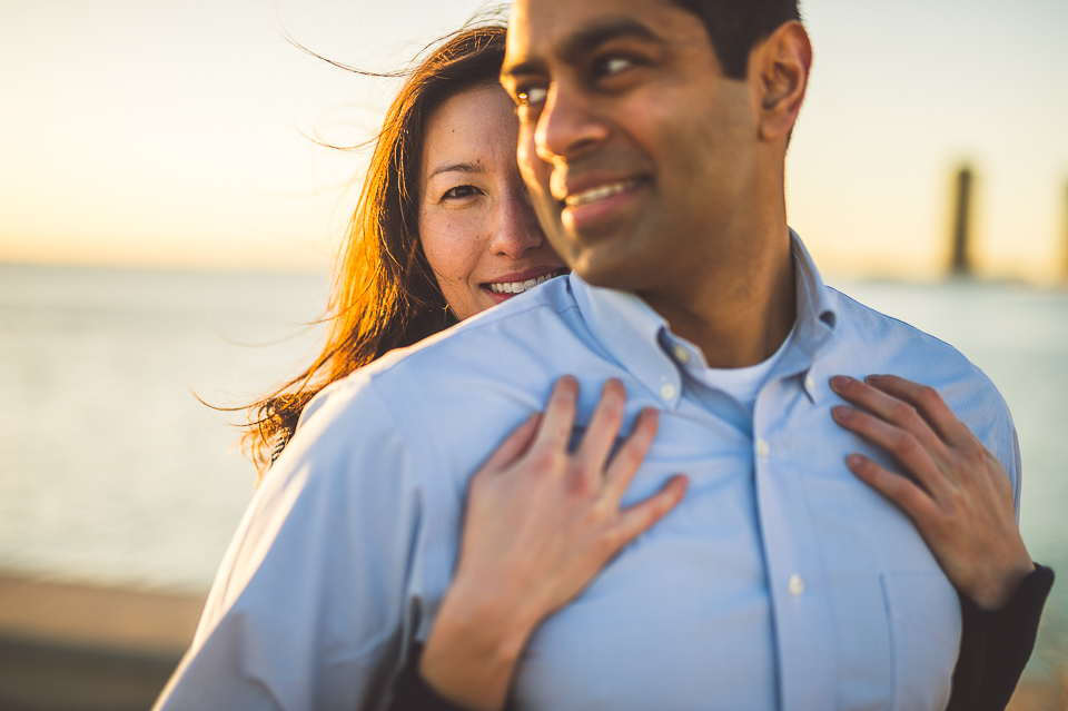 05 couple holding each other in chicago - Jackie + Raj // Sunrise Engagement Photos in Chicago