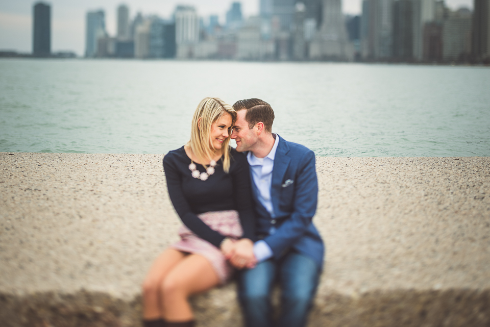 01 couple sitting on the beach - Engagement Photo Session Downtown Chicago // Kristina + Dave