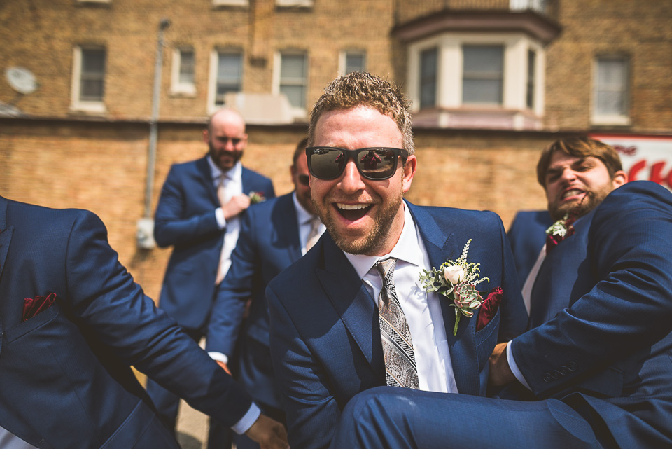 21 groomsmen being silly - Lindsey + Jack // Chicago Suburb Wedding Photography