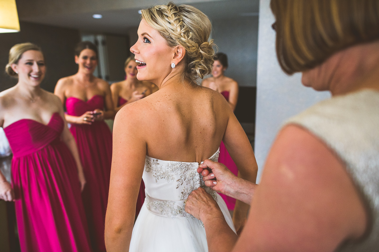 16 bride getting dress put on - Kristina + Dave // Wedding Photographer in Chicago