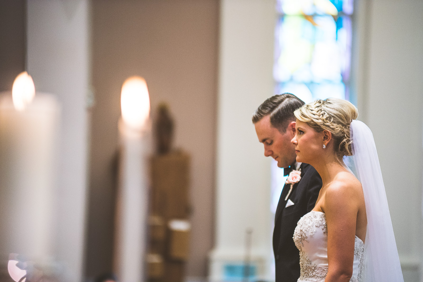 36 3 bride and groom at alter - Kristina + Dave // Wedding Photographer in Chicago