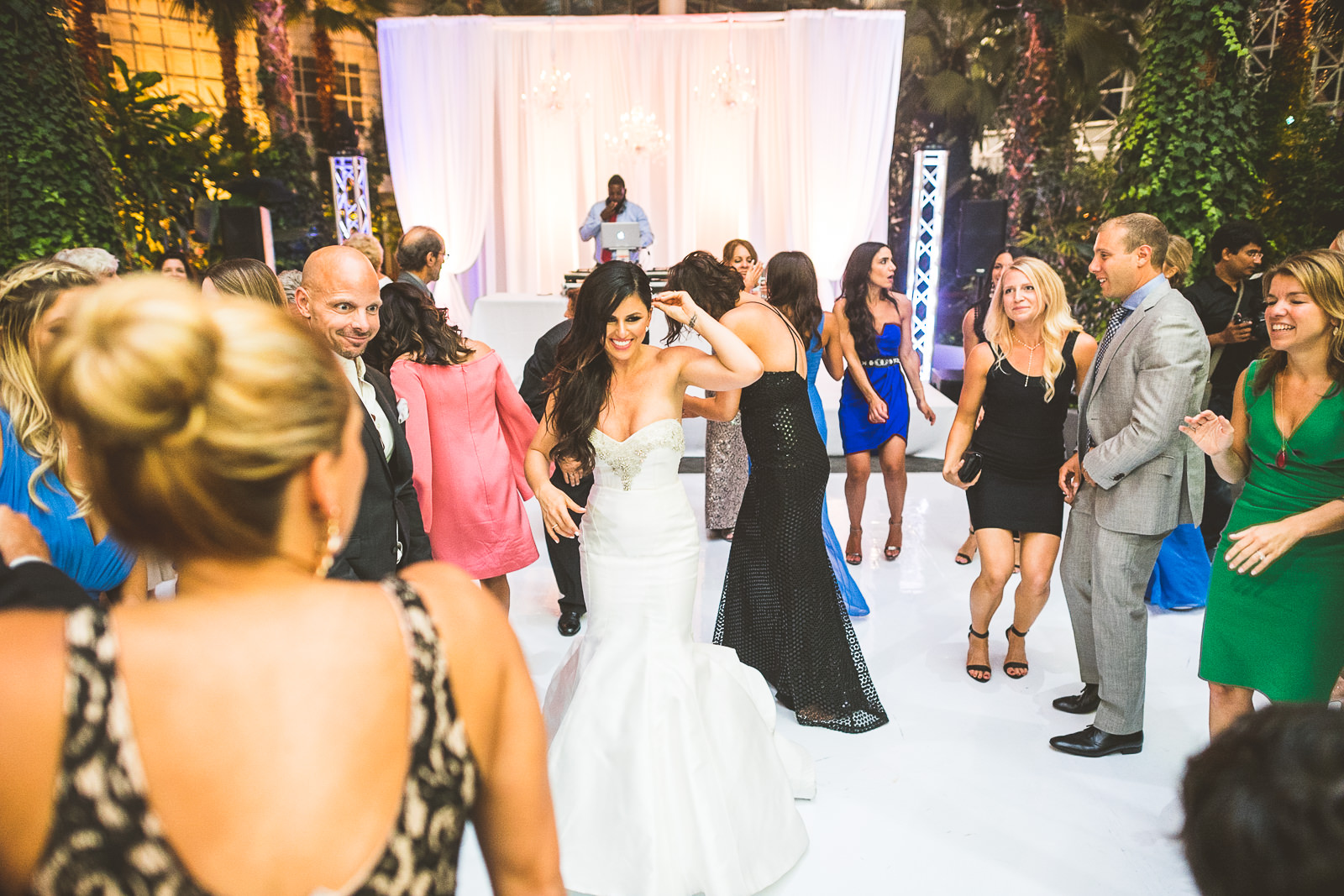 107 bride dancing - Marisa + Chris // Chicago Wedding Photos at Navy Pier Crystal Garden