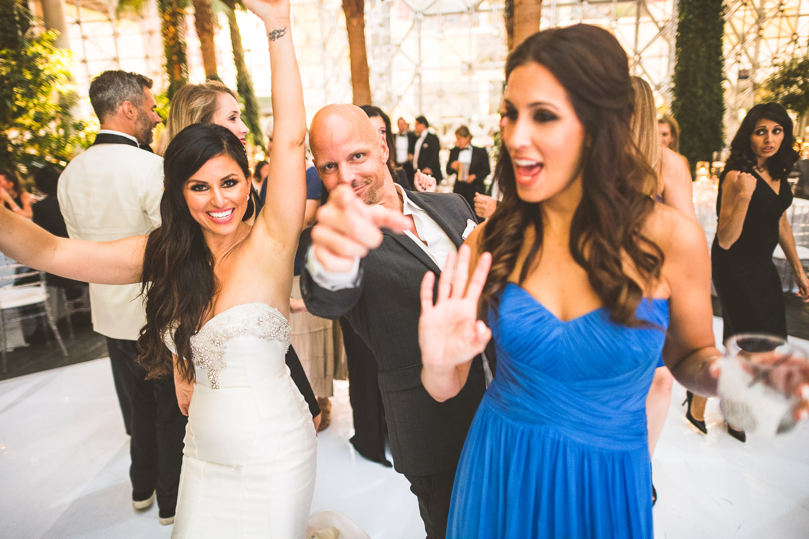 108 pointing - Marisa + Chris // Chicago Wedding Photos at Navy Pier Crystal Garden