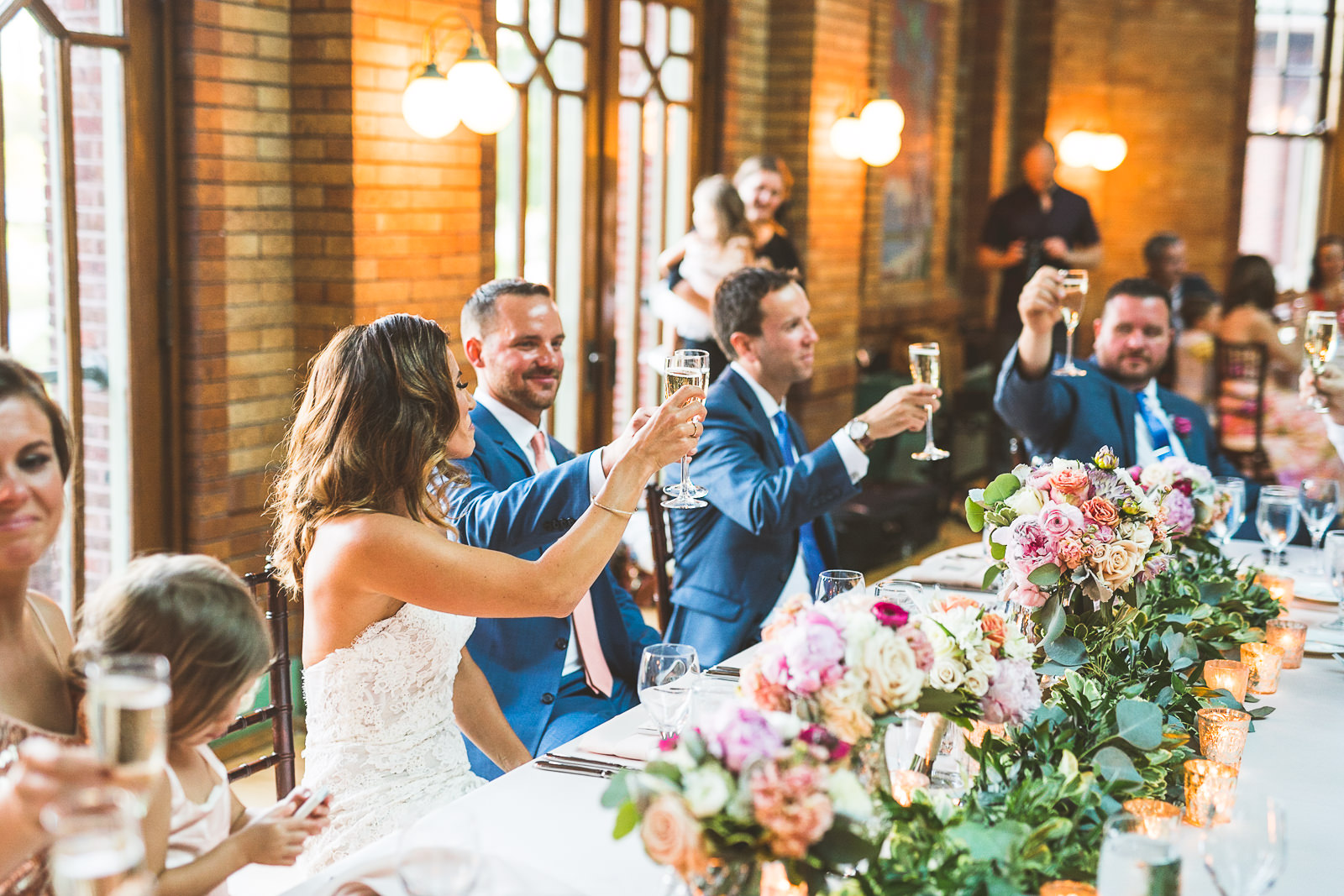 58 toasts - Natalie + Alan // Chicago Wedding Photographer at Cafe Brauer