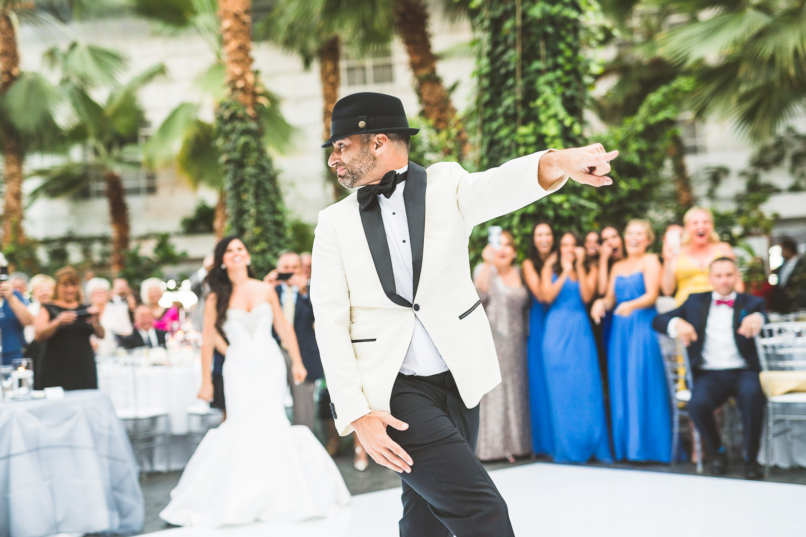 84 groom dance - Marisa + Chris // Chicago Wedding Photos at Navy Pier Crystal Garden