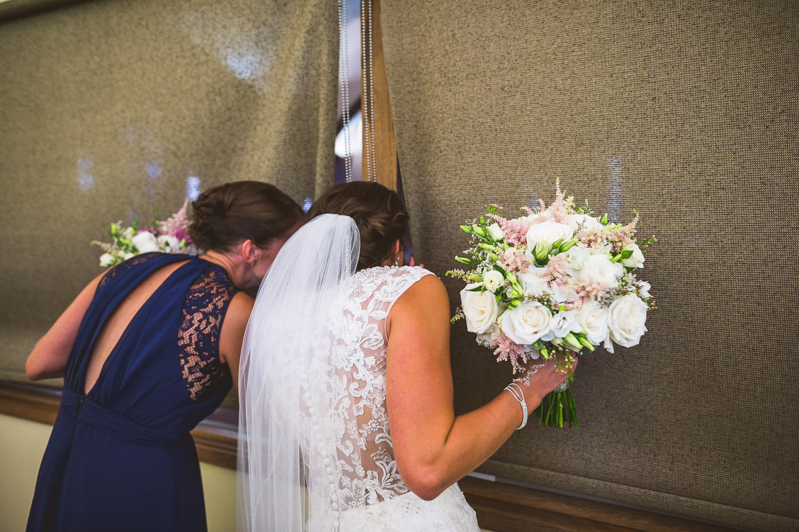 07 bride peeking - Brittany + Jeff // Indiana Wedding Photogrpahy