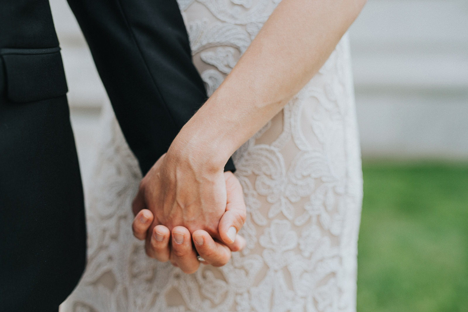 29 bride and groom holding hands - Megan + Jon // Orpheum Wedding Photography in Madison