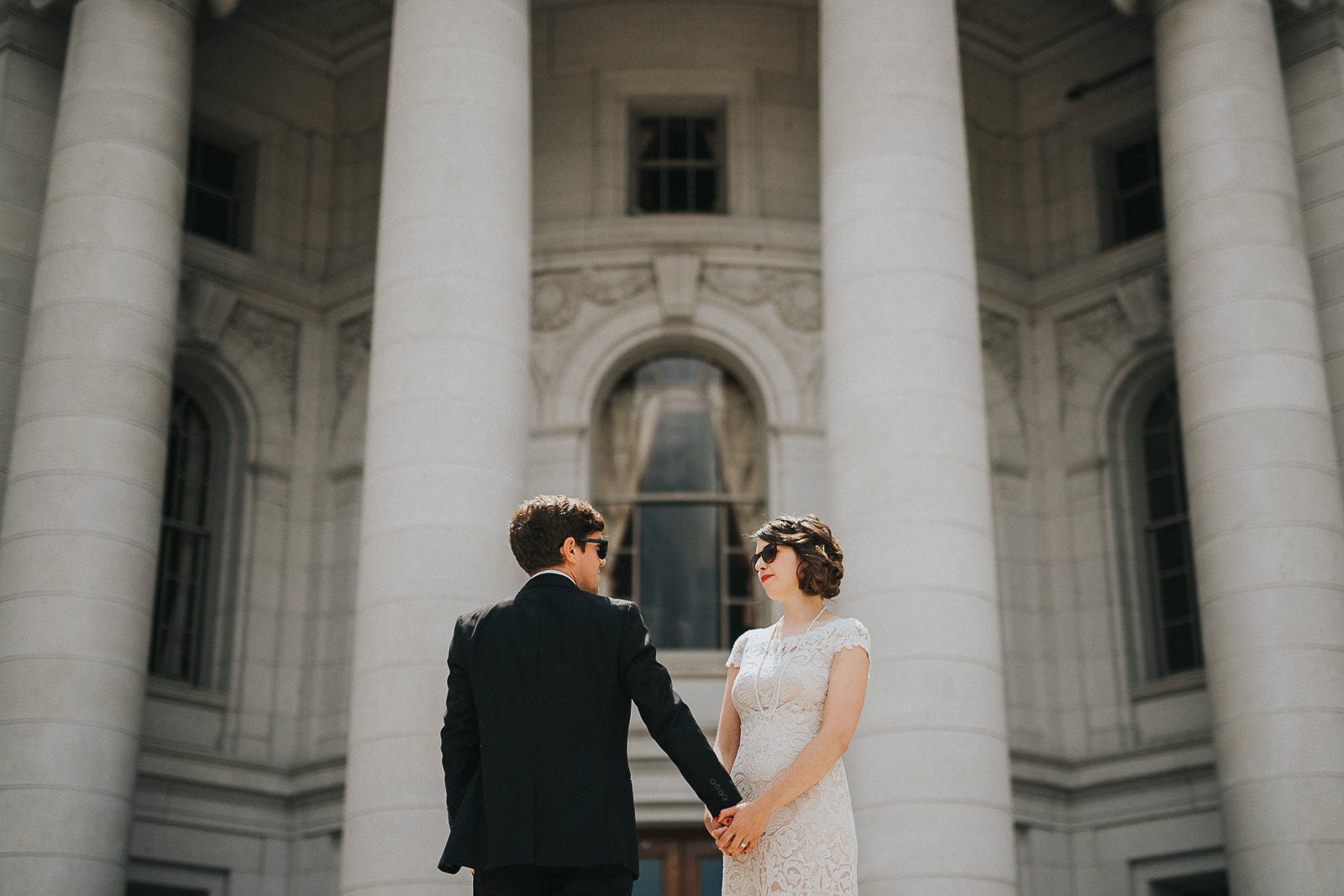 30 bride and groom in madison capital building - Megan + Jon // Orpheum Wedding Photography in Madison