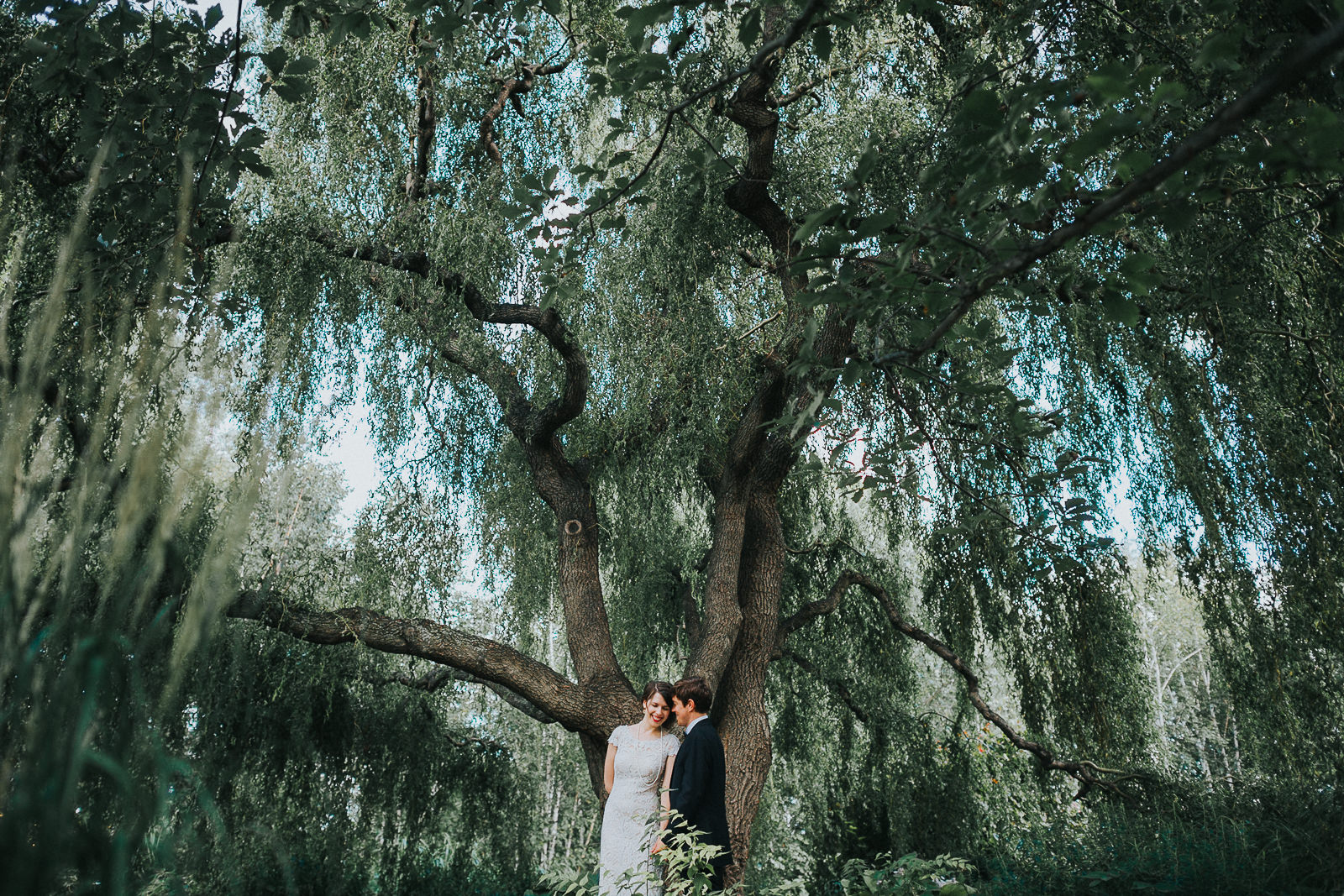 37 epic tree with bride and groom - Megan + Jon // Orpheum Wedding Photography in Madison