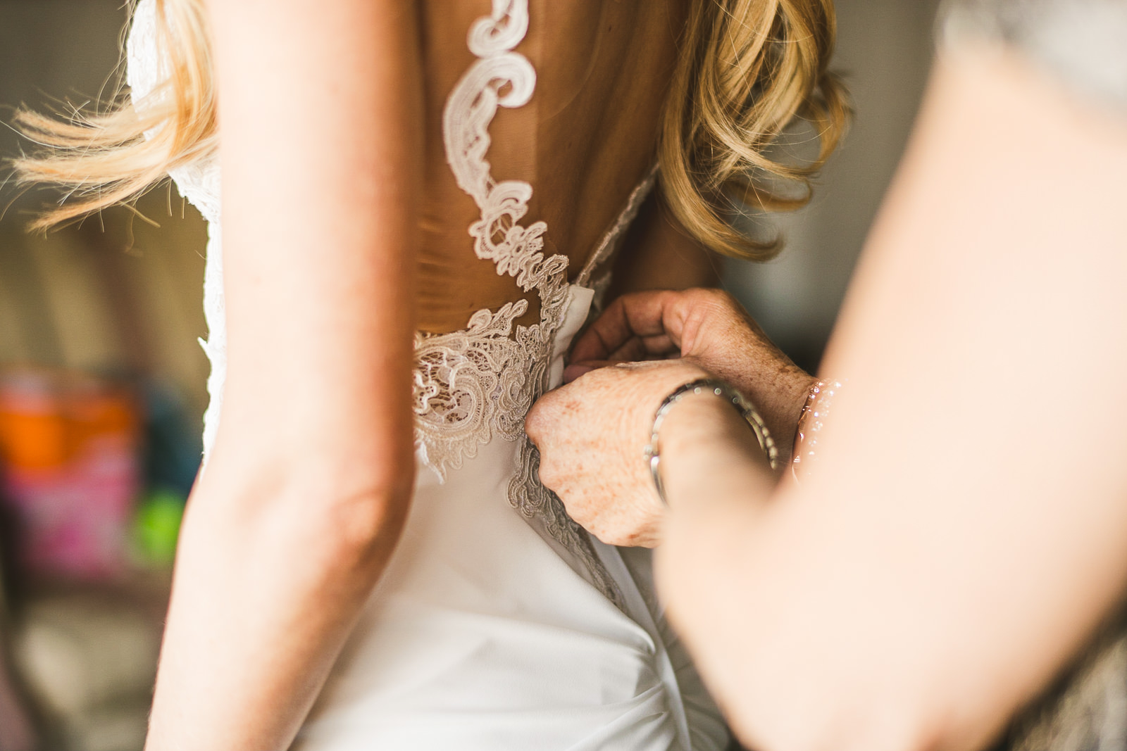 12 mom zipping up brides dress - Kayla + Terry // Drake Hotel Chicago Wedding Photos