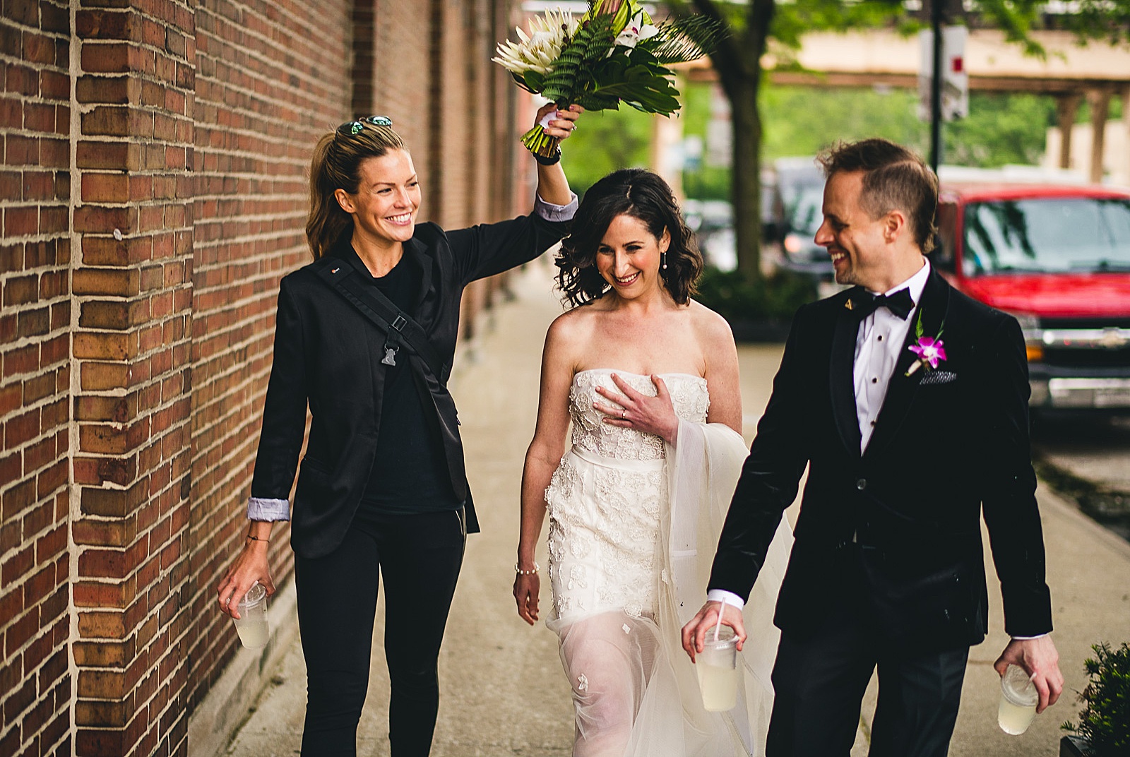 29 photographer covering bride during rain - Chicago Illuminating Company Wedding // Samantha + Jeremy