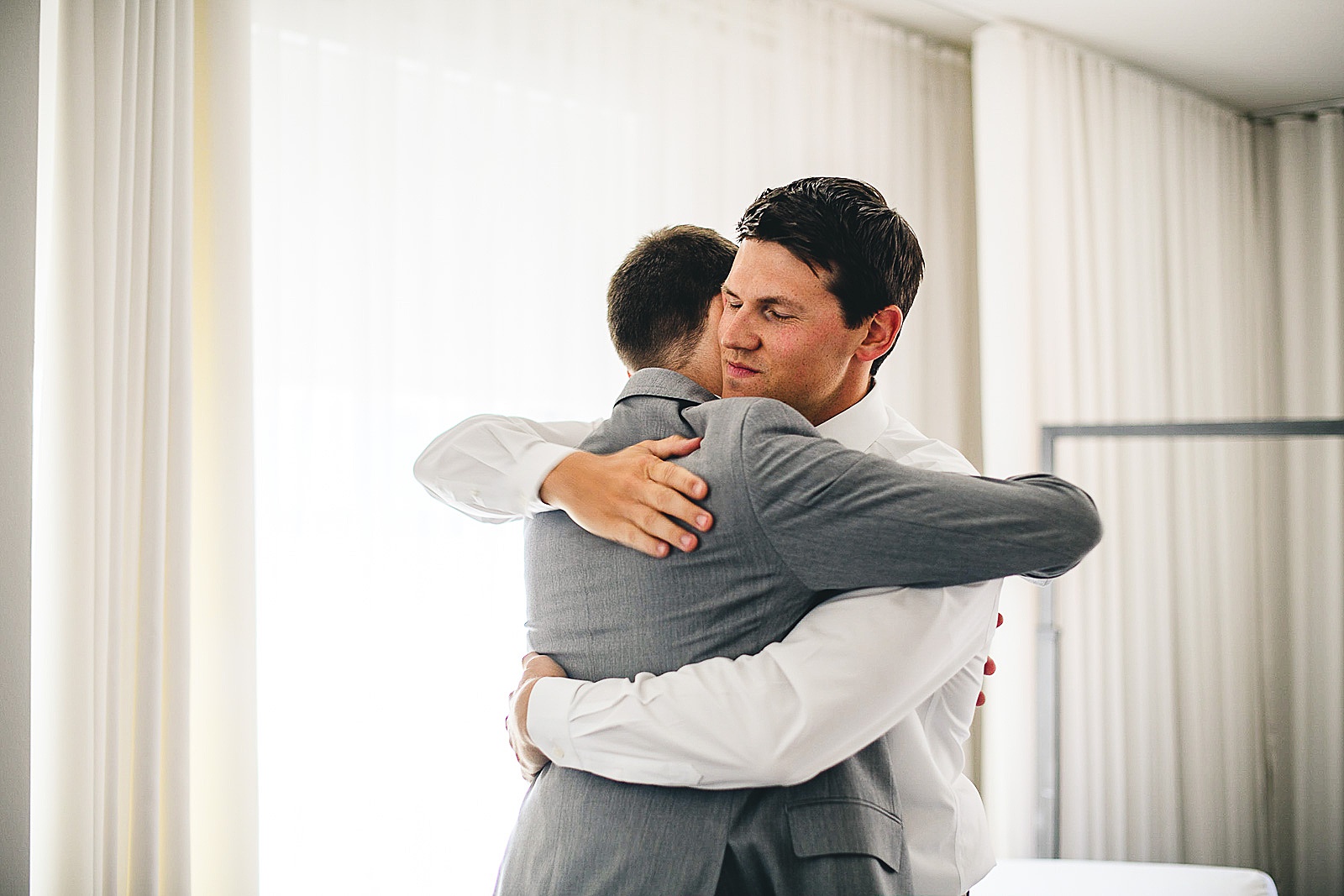 05 groom moment with his brother - Audrey + Jake's Beautiful Chicago Wedding at Chez