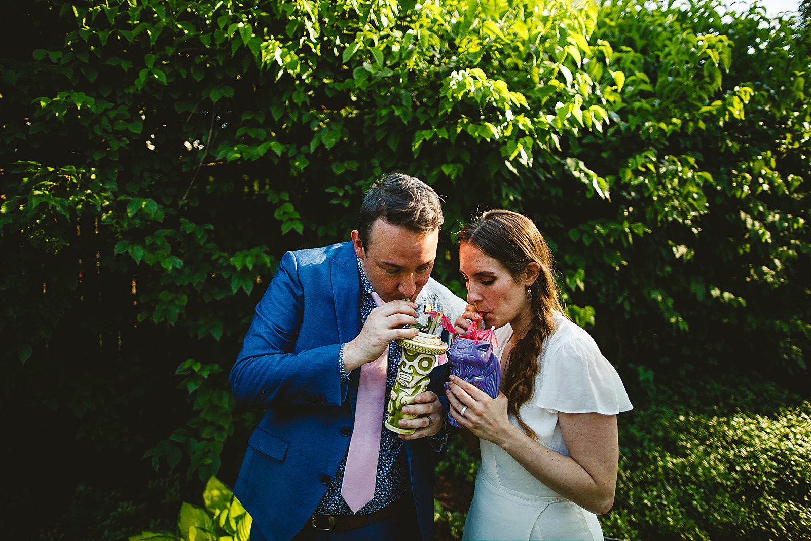 25 bride and groom enjoying drinks at their back yard wedding - Amazing Wedding in Backyard // Kristen + Jeff