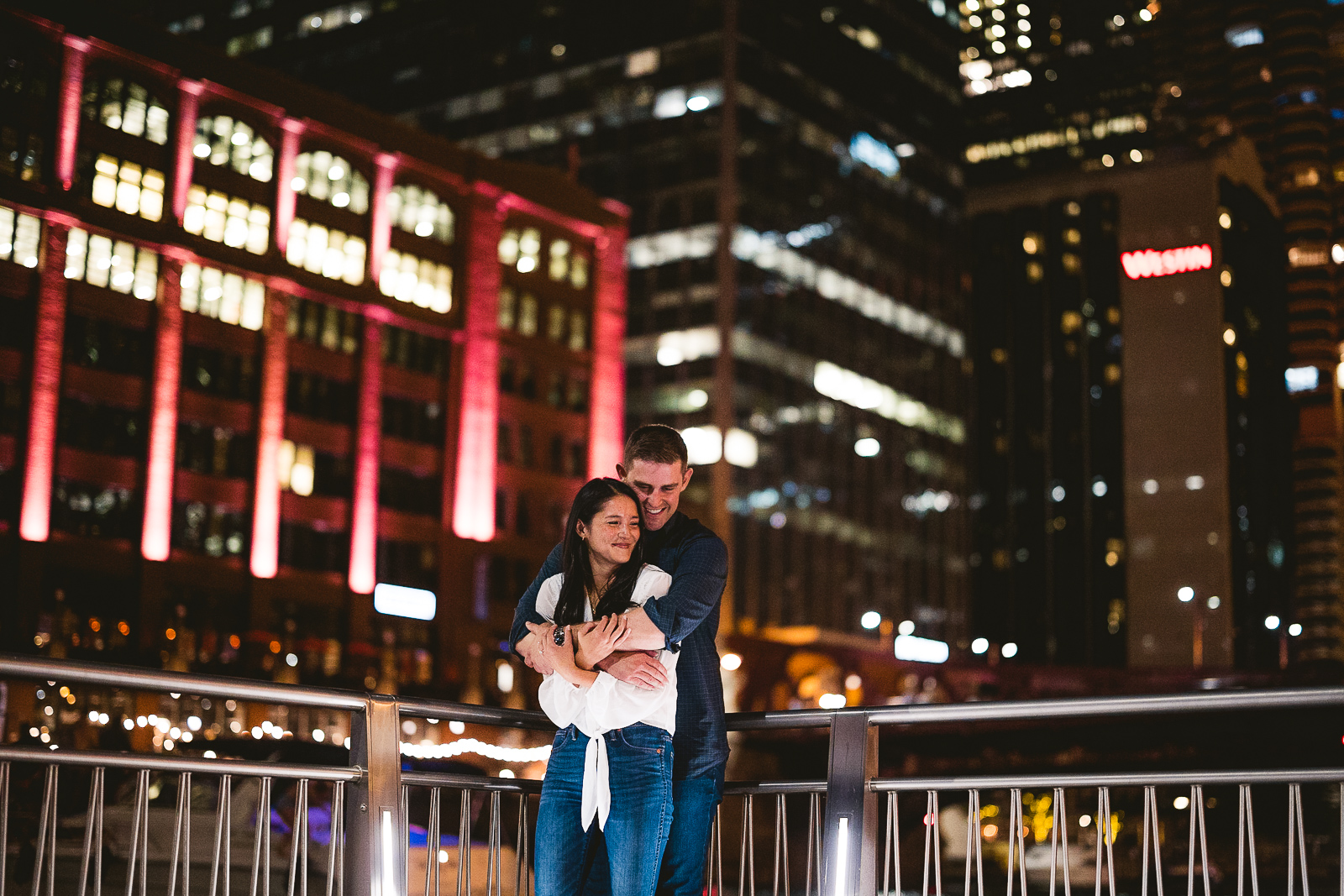 20 skyline of chicago from the riverwalk during engagement session - Alex + Jim // Sunset Engagement Session