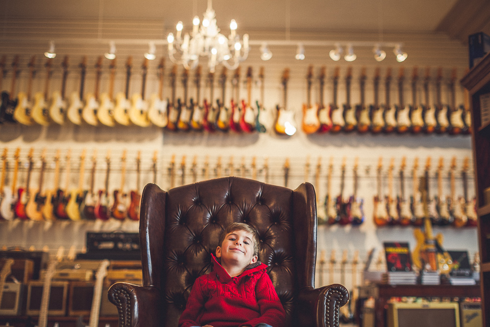 10 portrait of young boy at music store