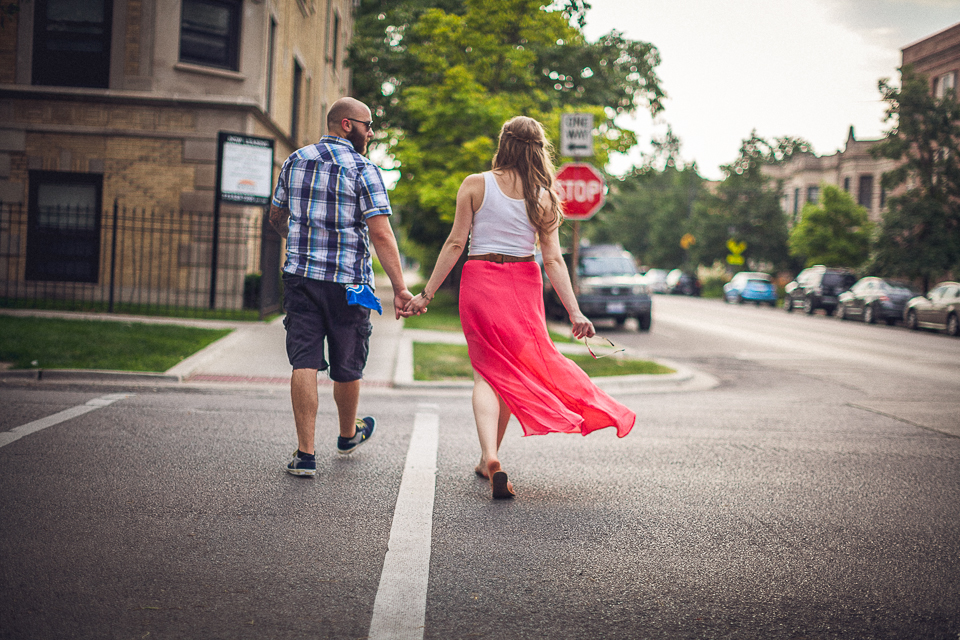 couple wakling during chicago engagement session