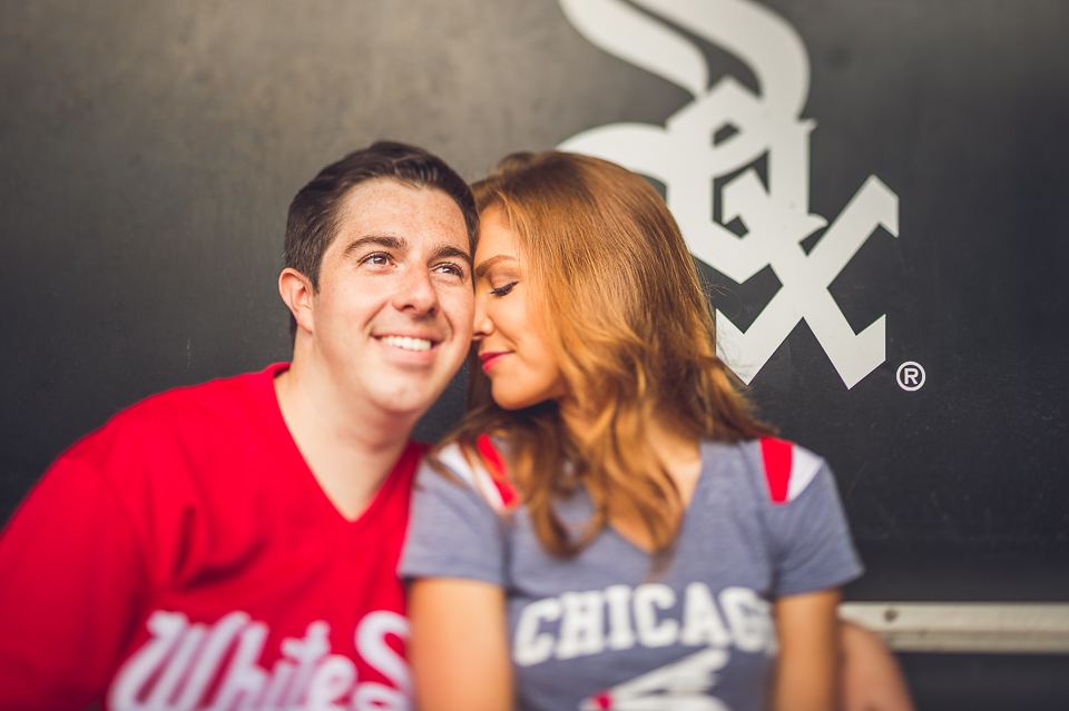 21 engagement photos in the sox dug out