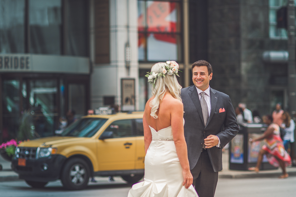21 bride and groom first look on michigan avenue in chicago