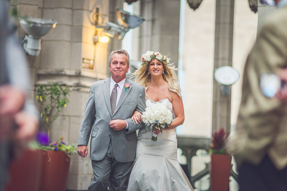 39 bride and father walking down the isle in chicago
