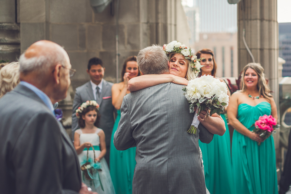40 bride hugs her father