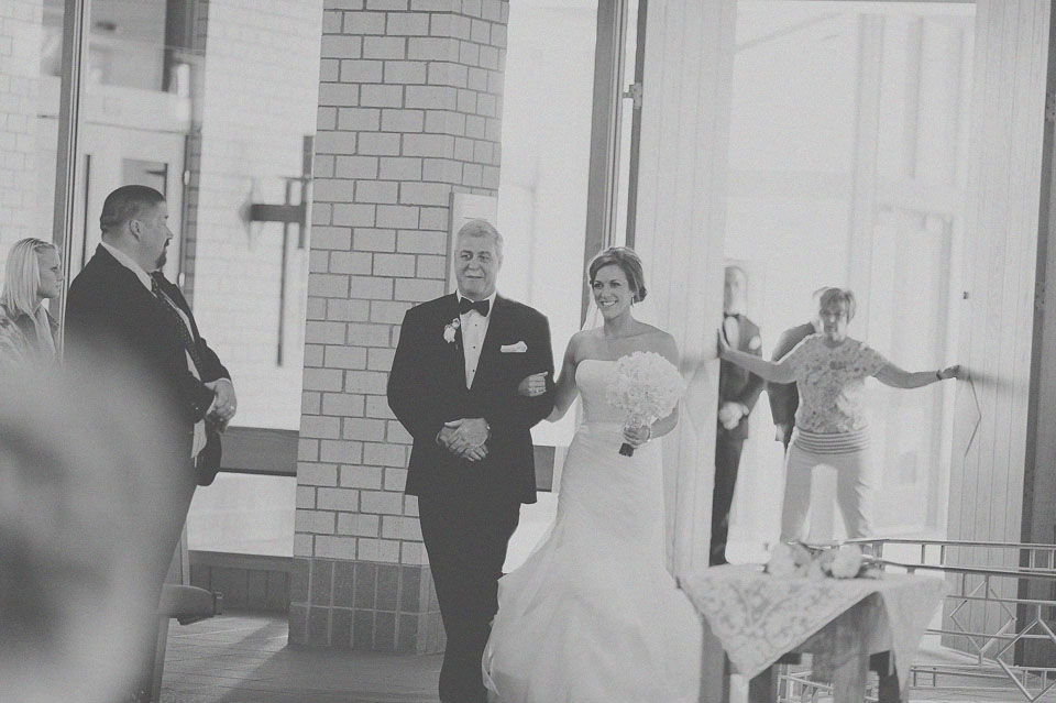 16 bride walking down the isle with father