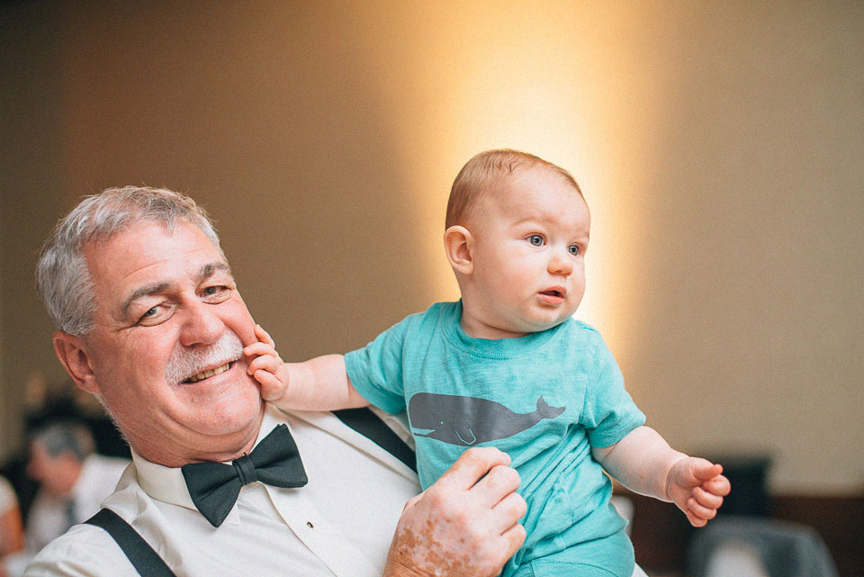 50 baby and grandpa at reception