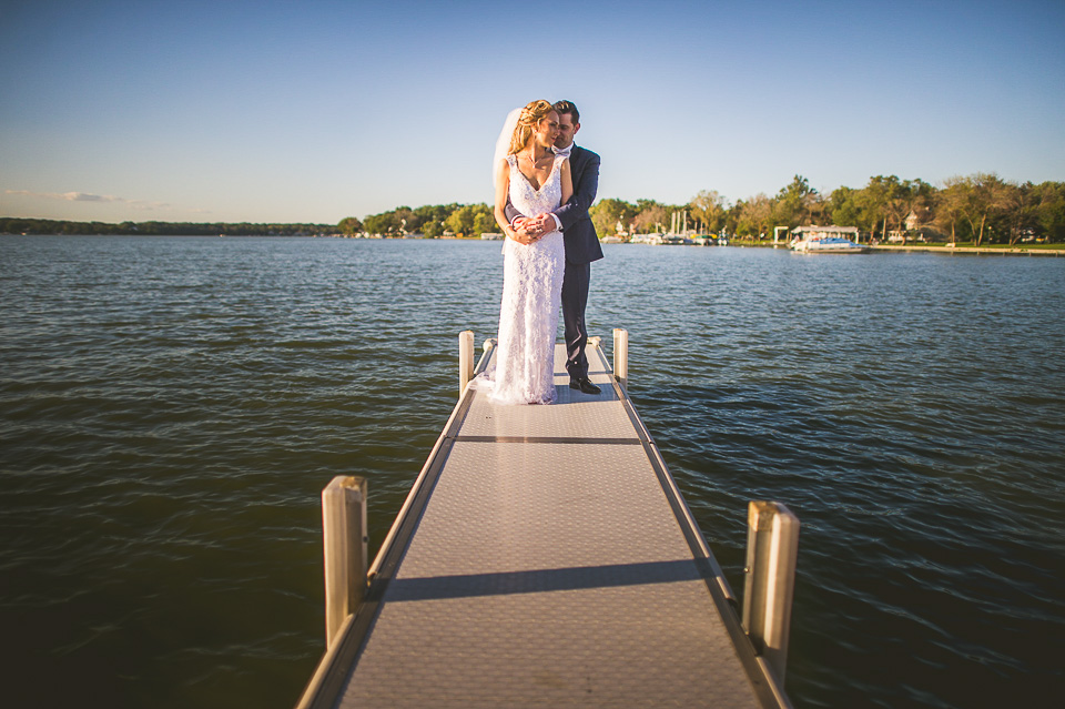 55 wedding portraits on a pier in ceder lake