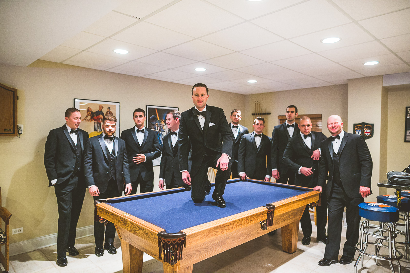 20 groomsmen on pool table